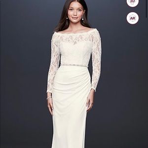 Long sleeved off the shoulder wedding dress.